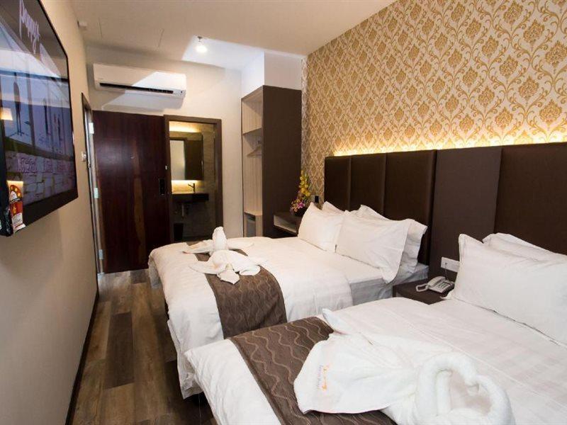 Spring Season Hotel Muar Esterno foto
